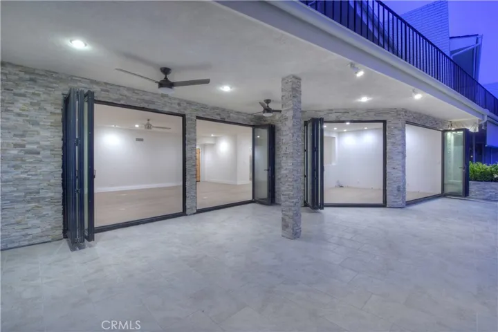 Patio into Living Room and Den/Office