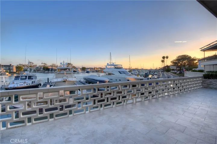 Patio view of harbor at sunset