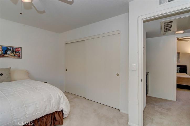 Second master has huge wardrobe closet.