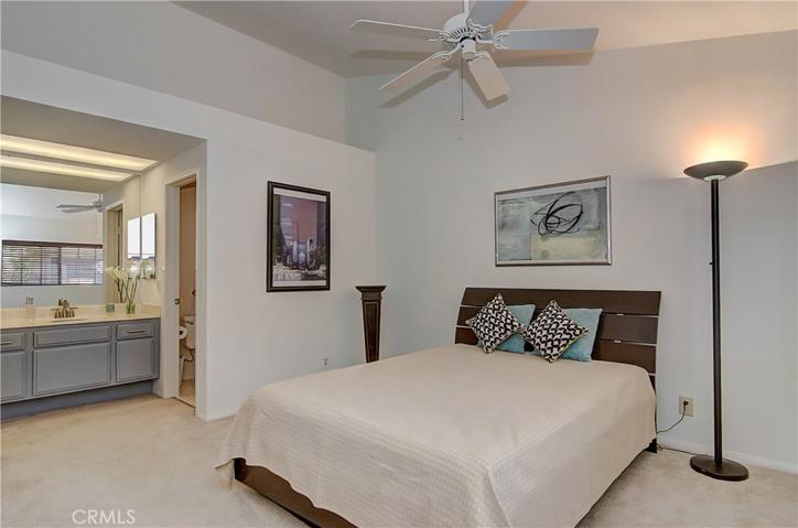 Huge master suite can accommodate any furniture requirements and has separate dressing area and walk-in closet.