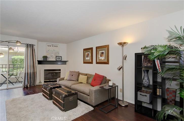 Large living room with fireplace and easy flow to outdoor space...doesn't get much better than this.