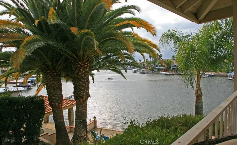 Looking West from rear deck.  Beach area below.