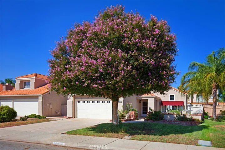 Wonderful curbside appeal with inviting courtyard.