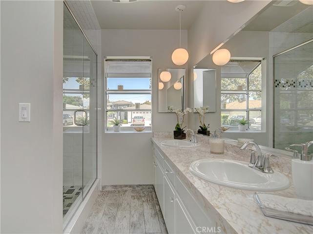 This hall bath is bright, airy and fresh.