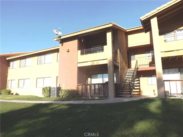 Located on a wide greenbelt with mountain view.