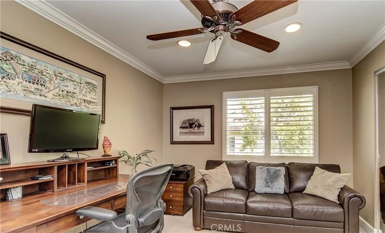 Fourth upstairs bedroom is being used as home office...check out how much furniture fits here!...plus large wardrobe closet too.