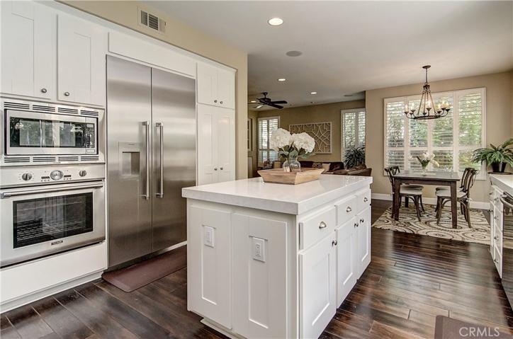 Kitchen, dining and family spaces flow together seamlessly here...even the cook gets to be part of the action!