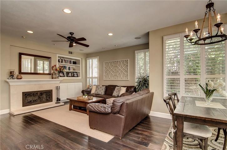Lovely fireplace with custom mantle, built-in storage and bookshelves too!