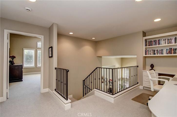 Upper loft area makes a nice transition space and separates master wing from secondary bedrooms.