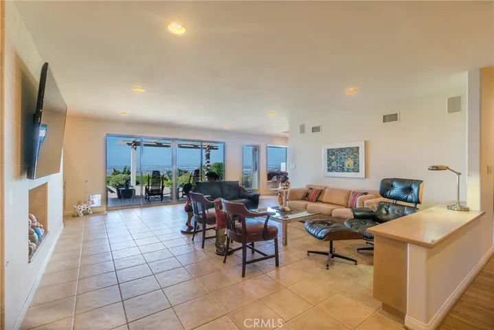 The views continue in the open, bright, and light family room.