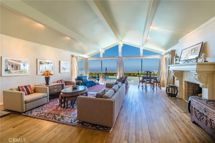 Your guests will be impressed by the stunning views of the pool, spa, and LA Basin as soon as they enter the home.