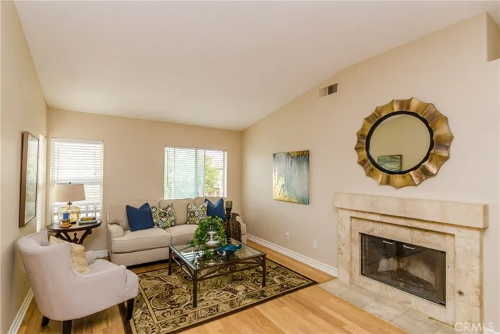 Fresh paint, refinished wood floors and views of the trees and sunset from your living room.