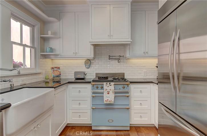 Wow...not your grandmother's kitchen...except for the warmth and classic features both of you will love.