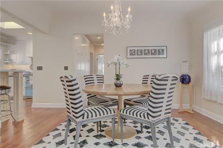Another wonderful blend of original details including cove ceiling and casement windows, hardwood floors and more.