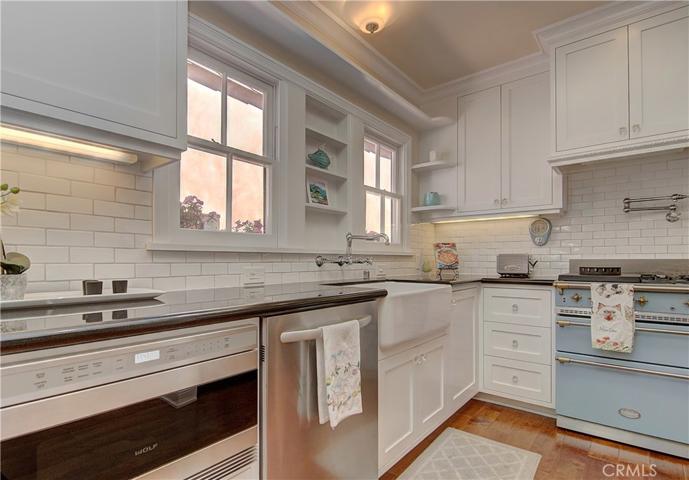 Wow is right...this contemporary kitchen fits just right in this period home...the best of both eras!