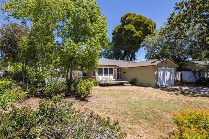 Side yard in front of house