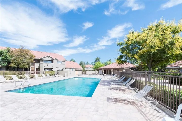 The fitness and laundry room are close to the pool area.