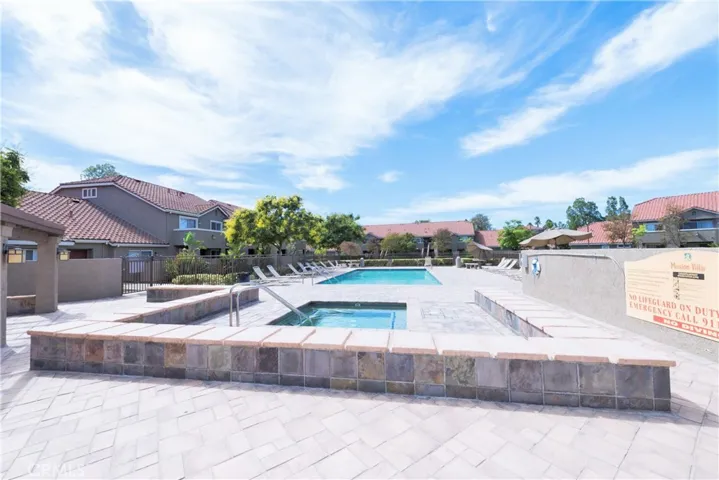 There is an inviting pool and spa in the HOA area.