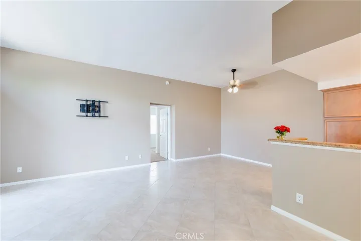 You are greeted with large tile flooring and lots of light as you enter the condo.
