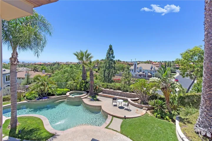 Fabulous view of pool, spa, fountains and forever views from Master Bedroom balcony