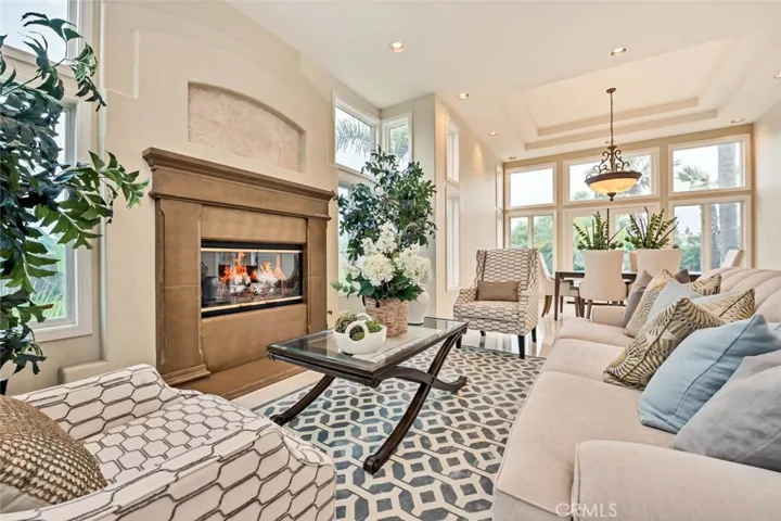 Huge living room with high ceilings and plenty of natural light