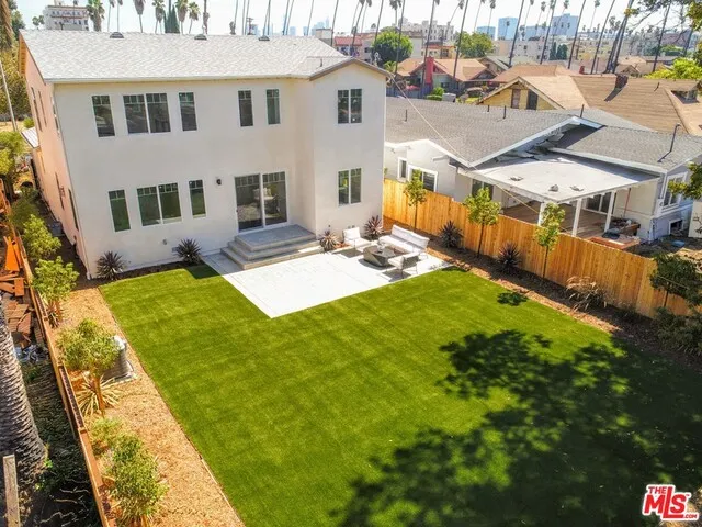 Beautifully landscaped backyard with room for pool or guest house