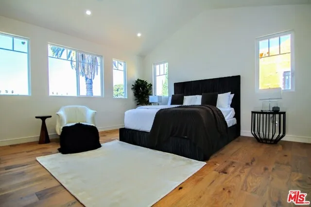 Master Suite Retreat with vaulted ceilings & lots of light