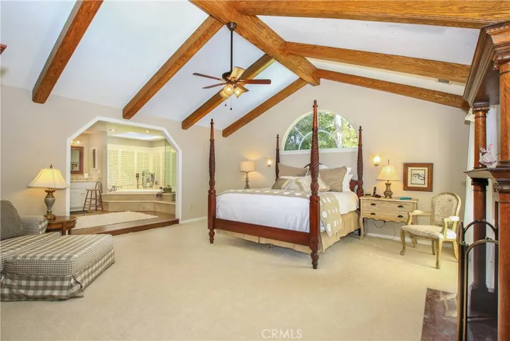Master Bedroom with Beamed Ceiling
