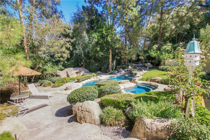 Park Like Backyard with Pool, Spa and Fire pit