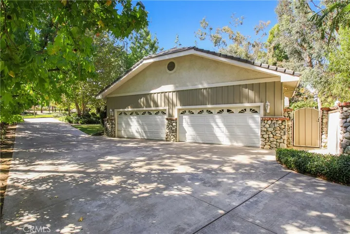 4 Car Attached Garage with Long Driveway