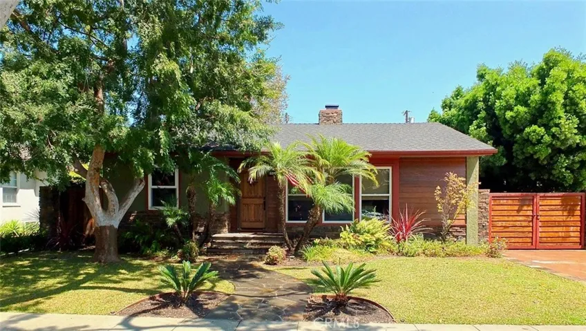 Welcome to your new home, with it's lush landscape and beautiful hardscape.