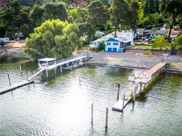 View of complex with boat dock to the left.