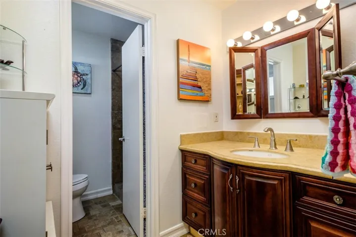 Large master bathroom with separate vanity and shower rooms.  Bathroom has been elegantly remodeled.