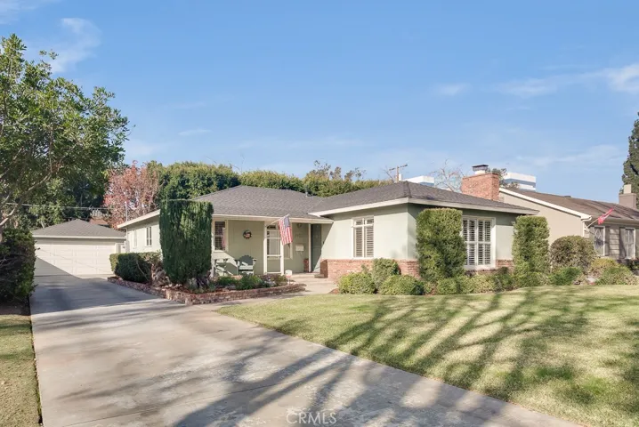 Custom built in 1953 with traditional architecture set on a quiet tree lined street in park Santiago.