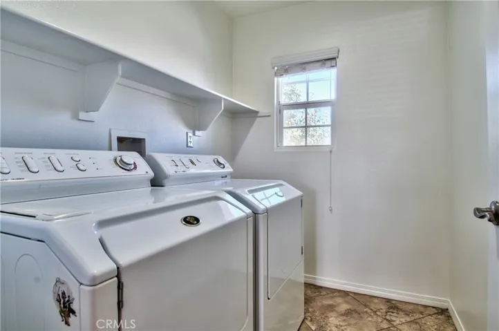 Upstairs laundry room.