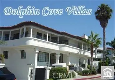 THE SPECTACULAR "DOLPHIN COVE VILLAS" BUILDING FROM THE STREET...
