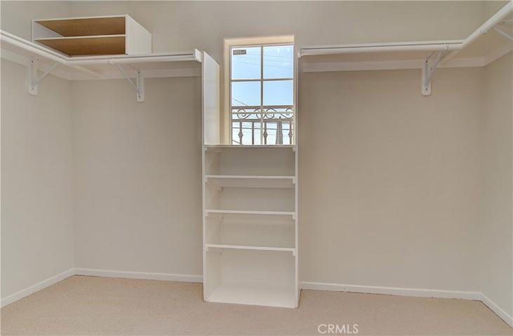 Huge walk-in closet in master bedroom.