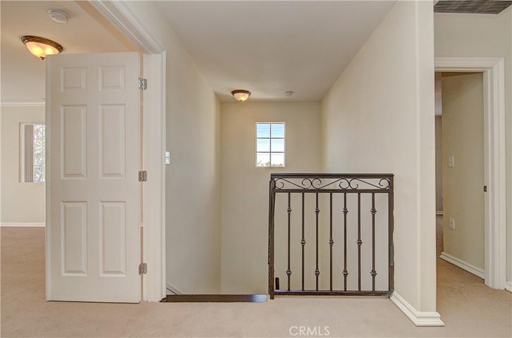 Spacious upstairs landing provides a nice separation between bedrooms and bathrooms.