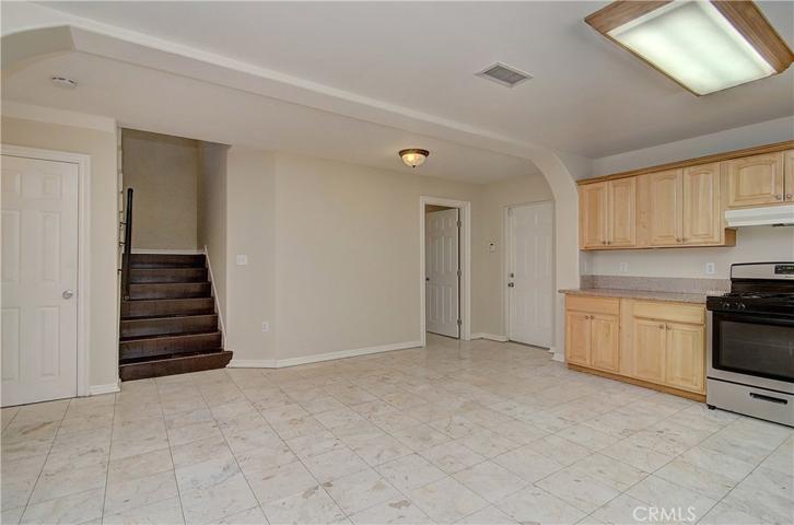 Easy transition to upstairs and garage...this kitchen is definitely the hub of the home.