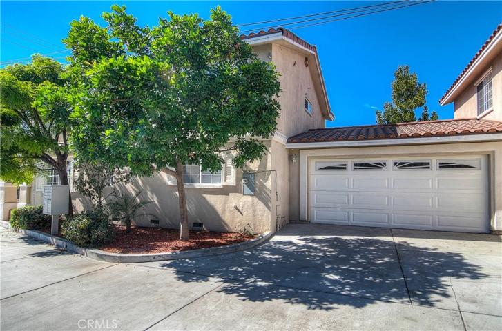 Private driveway and large two car garage.