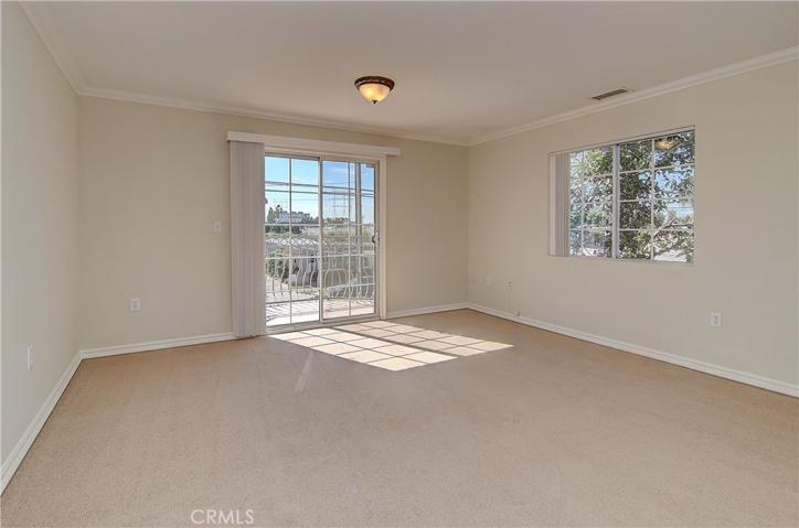 Large master bedroom with slider to spacious balcony...a nice getaway!.