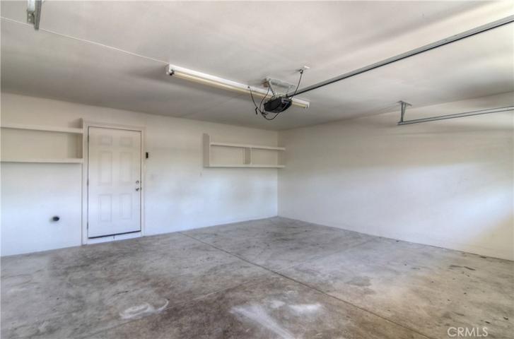 Roomy two car garage with laundry area...finished just like a room!