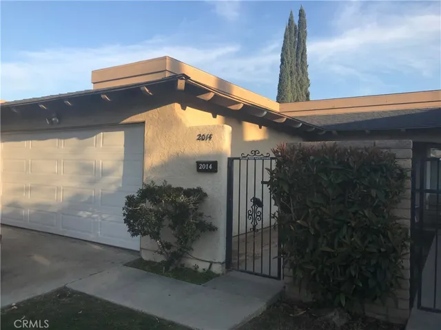 Front Entry with gated courtyard at end of a culdesac street