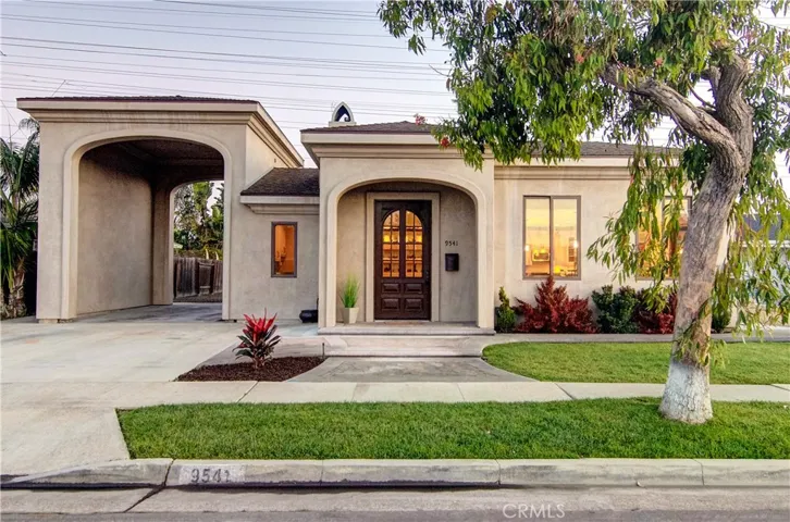 Fantastic curb appeal with classic Mediterranean details in this architectural masterpiece.