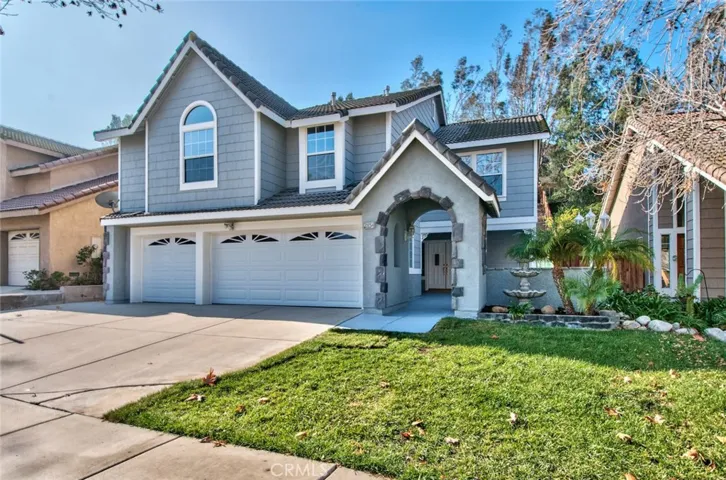 Charmingly situated on a tree-lined street in the acclaimed community of Sierra Del Oro next to Yorba Linda, this 5-bedroom home offers the comfort and modern amenities you're looking for that surpasses every home in this price range. You will fall in love with its attractive curb appeal, featuring brand new garage doors and new exterior paint almost throughout.
