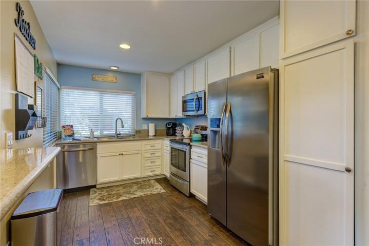 All the Bells & Whisltes in the Remodeled Kitchen: Note the Extensive Amount of Cabinets and Oversized Pantry!