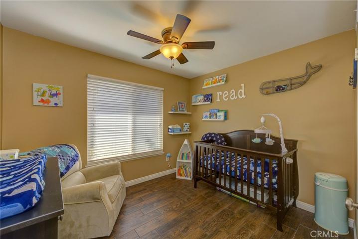Ceiling Fan, Check.....Contemporary Blinds, Check.....Easy Care Floors, Check.....MOVE IN CONDITION, DOUBLE CHECK! BR. #2 showcases another reason why this Remodeled Home is a great value.