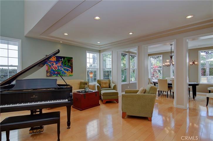 So many beautiful details...tray ceilings, crown moldings, cased archways...plus loads of natural light.