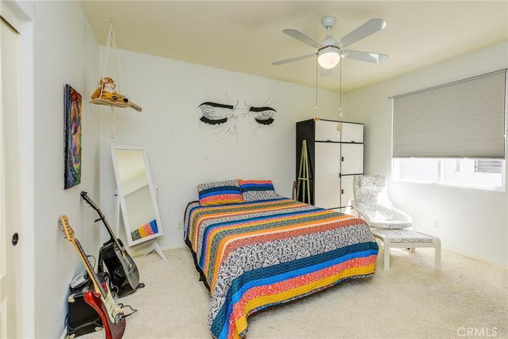 Both kids rooms have plenty of space for the artist, musican, or in this case...the artist who is also a musician...large wardrobe closets too!