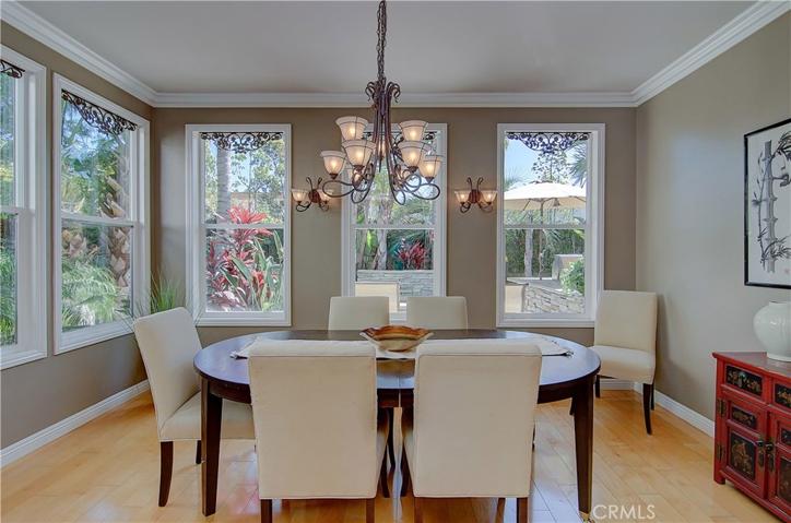 The perfect formal dining room!  Loads of windows offer beautiful views of private rear yard.